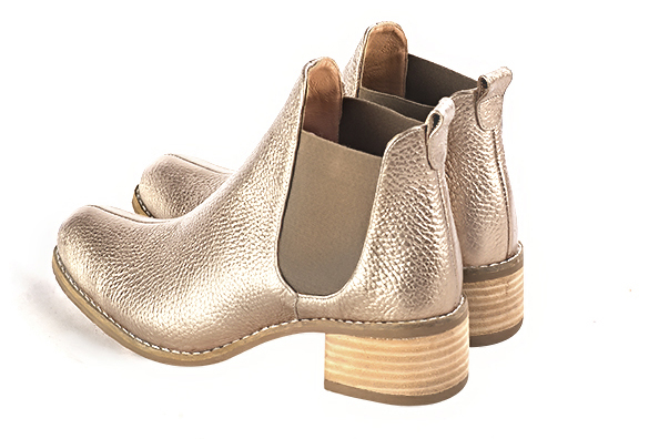 Tan beige women's ankle boots, with elastics. Round toe. Low leather soles. Rear view - Florence KOOIJMAN